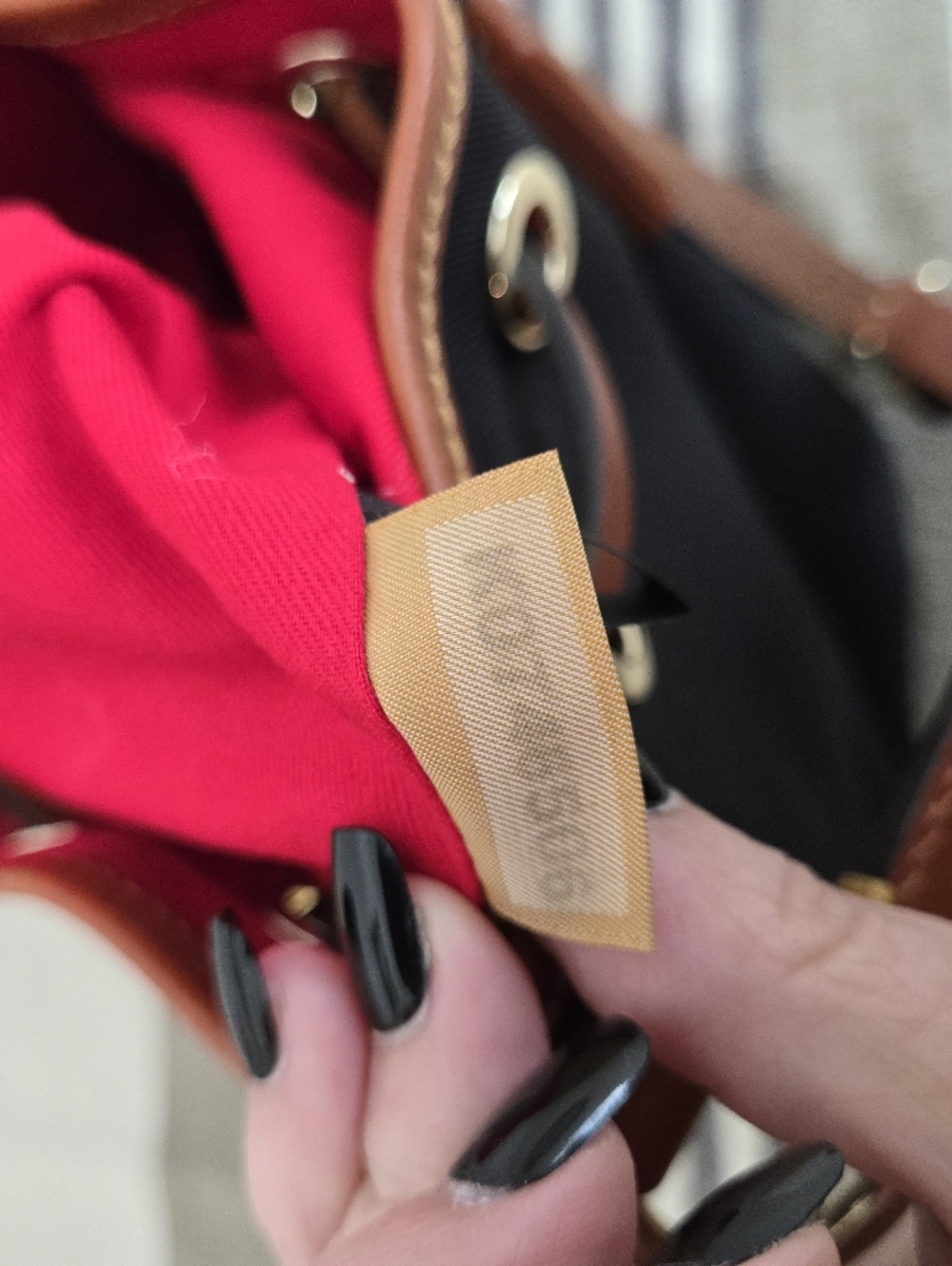 Dooney & Bourke Black Nylon Bucket Bag with Brown Trim and Tassels - Picture 14 of 16